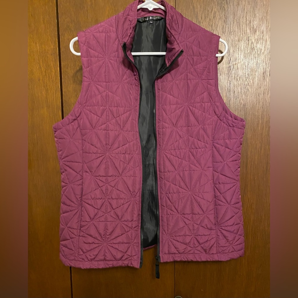 Plum colored sleeveless vest